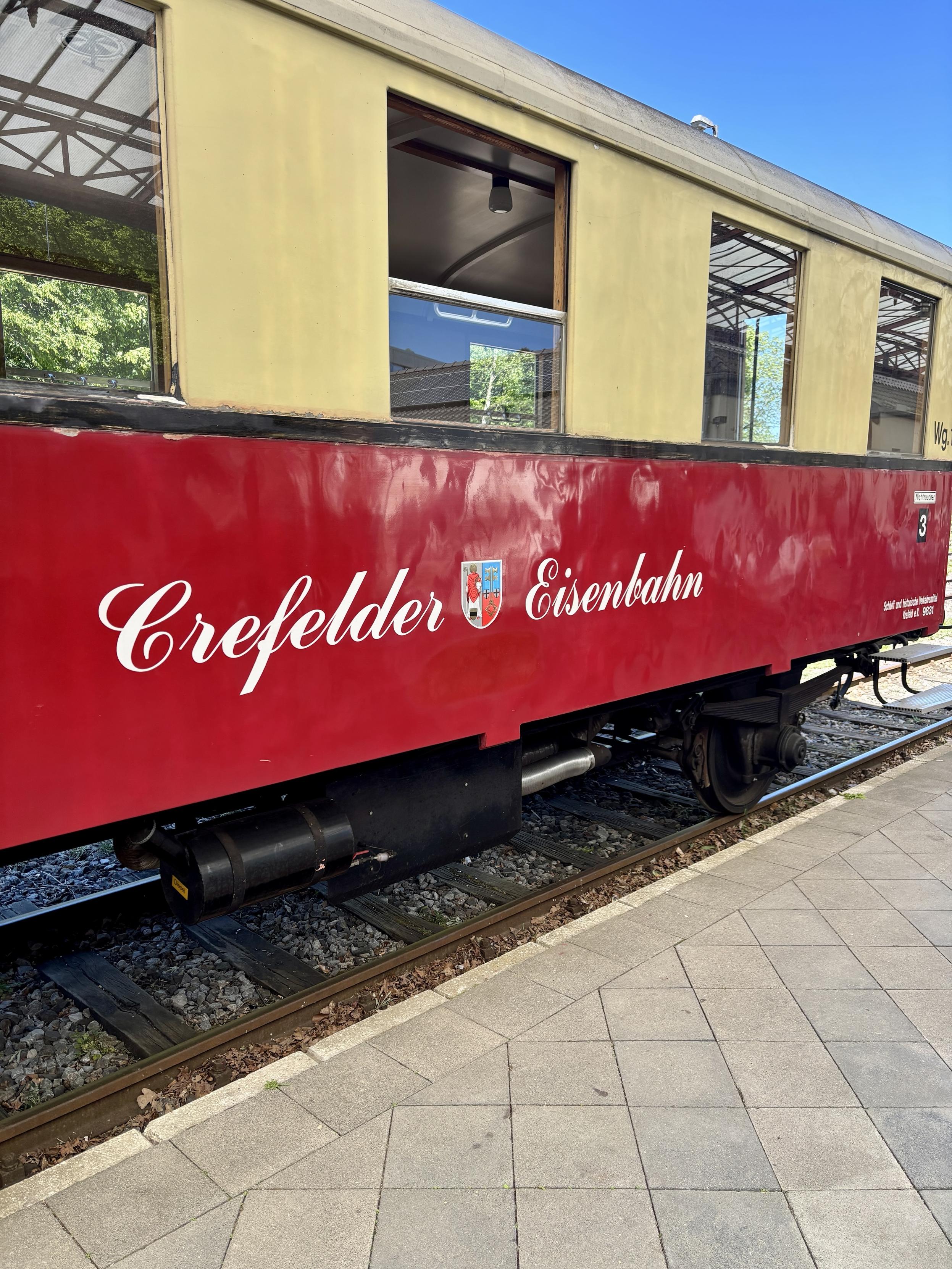 A red train car featuring the text 